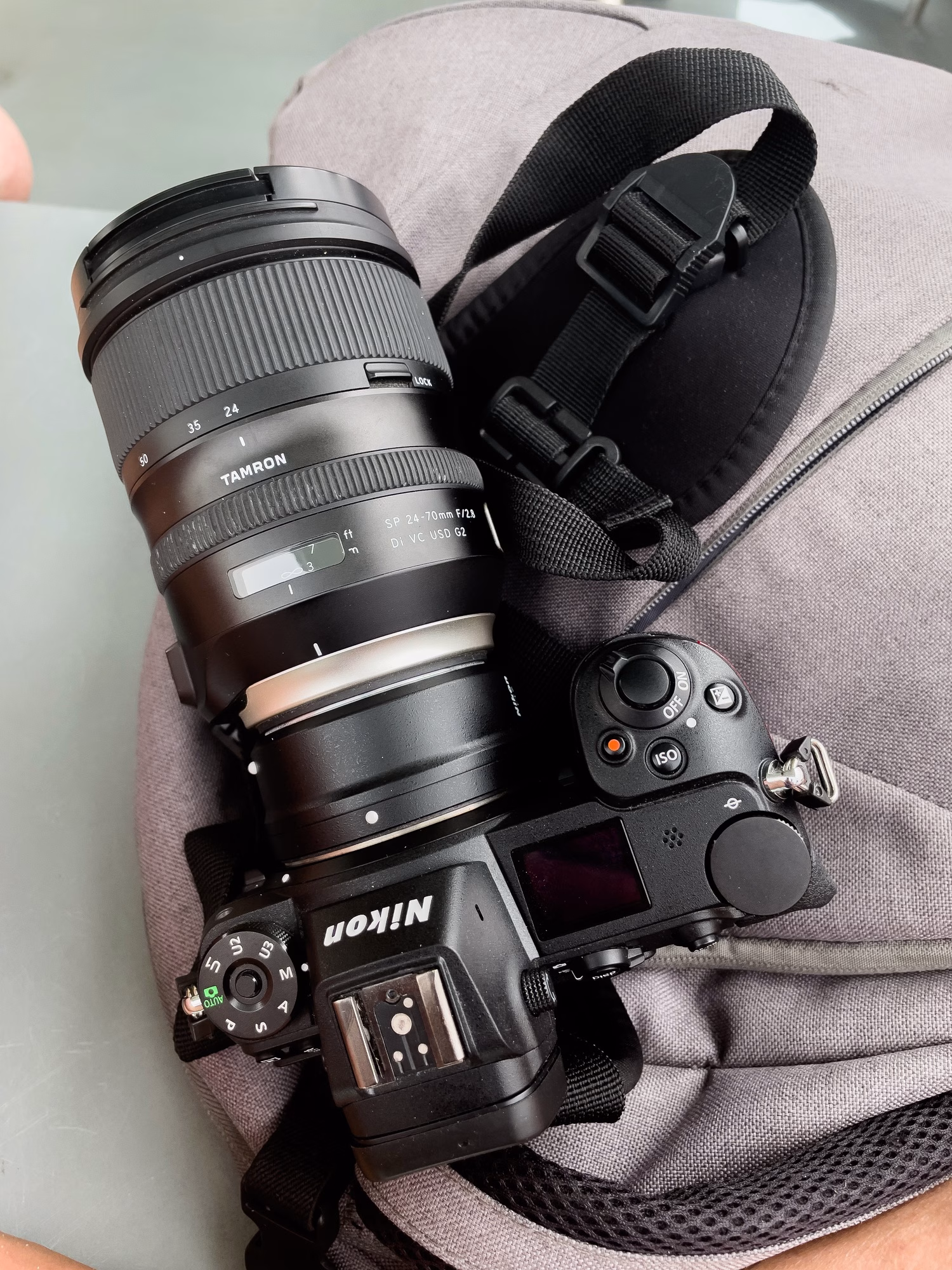 Modern photo camera with lens